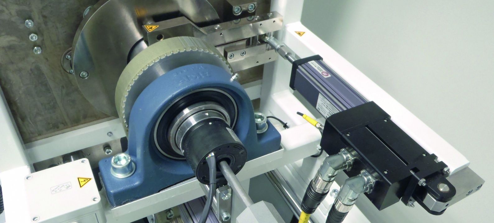 Feeding of voltage cables with Exlar electric actuators ATB Automation