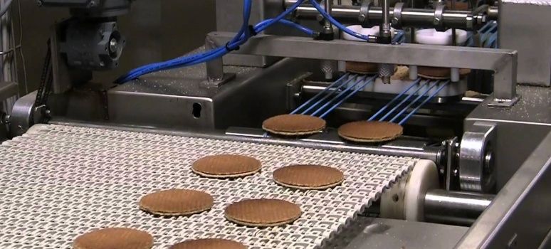 Dosing machine syrup waffles with Exlar roller screw servo actuators